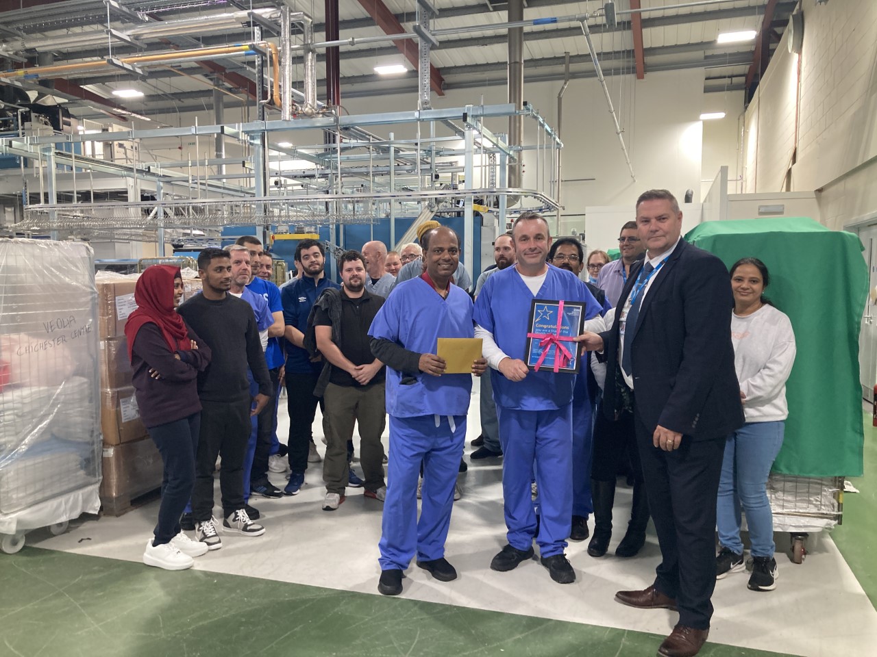 Laundry team clean up with Star of the Month award University