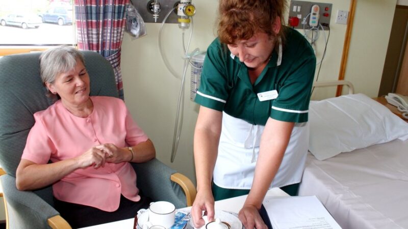 Patient and nurse on the Chichester Suite