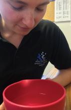 A person holding a cup