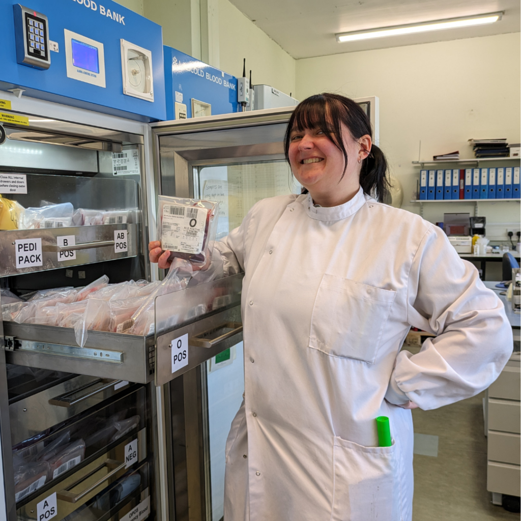 Jen, Specialist Biomedical Scientist with a blood pack in the lab