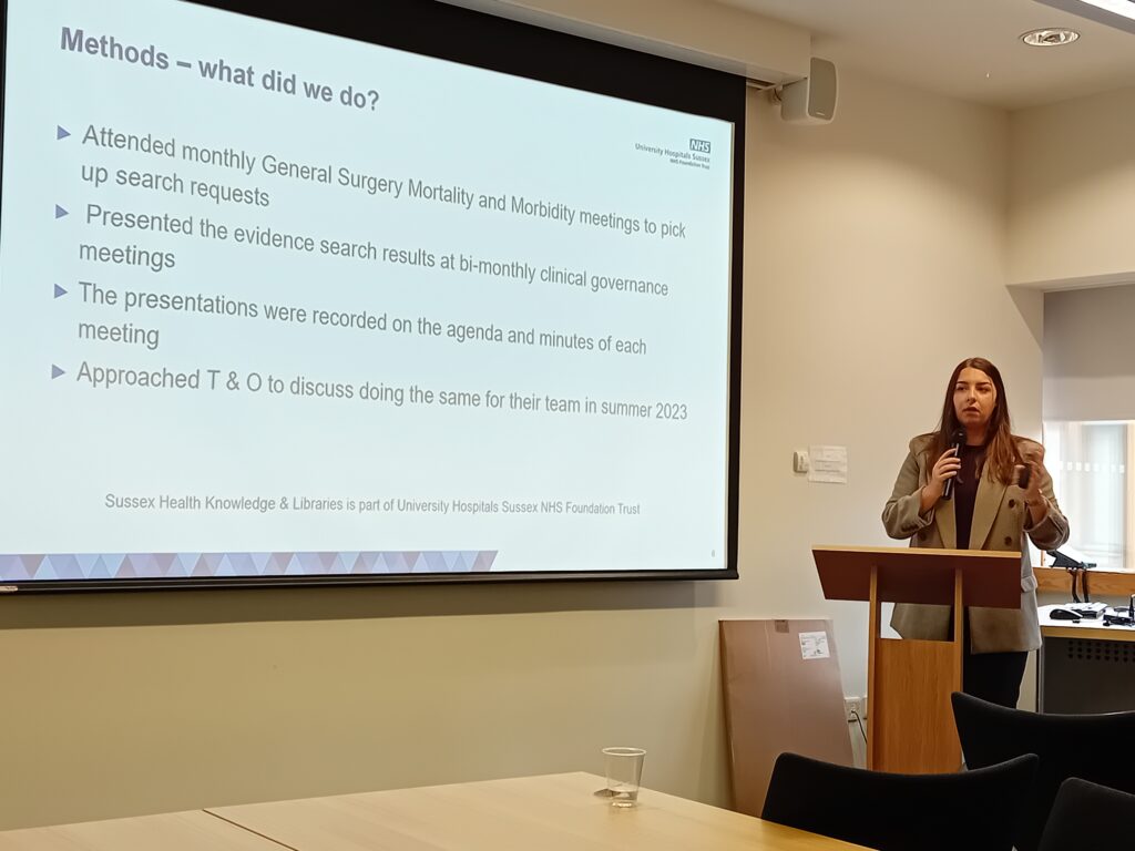 Lucy Wells presenting her project at the Clinical Knowledge Specialists Conference in November 2023
