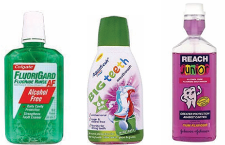 Shwoing bottles of Colgate Fluorigard, Aquafresh mouthwash and Reach mouthwash.