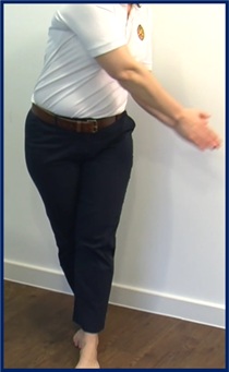 Moving arms, hands together in a figure of 8.