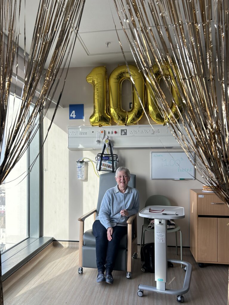 patient holding cake