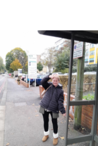 Maria at the bus stop