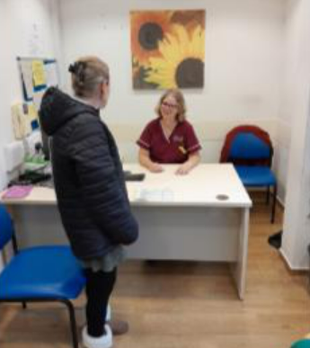 Maria arriving at reception