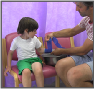 Removing the soaked cast
