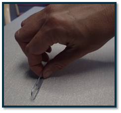 fine finger tasks, picking up a small object.