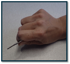 fine finger tasks, picking up a small object.