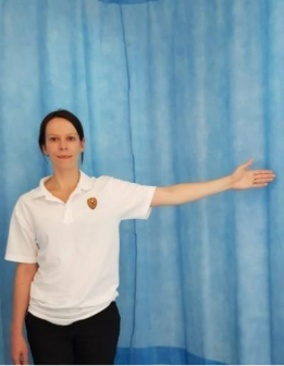 Raising your arm out to the side   
