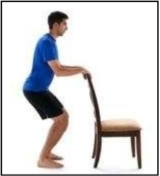 A person practicing a squat. © Wibbi