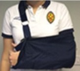 A person with a shoulder sling on