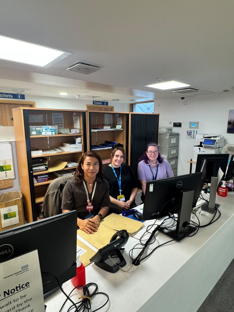 Colleagues at their desk working Super Saturday