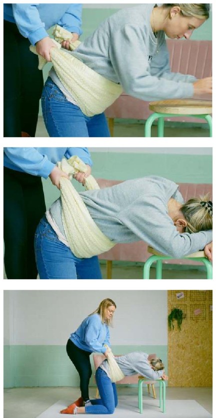Three photos show a person leaning forward or on all fours while another person holds and moves a wide cloth under and around the bump.