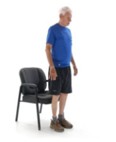 Sit to stand exercise - man standing up from the chair