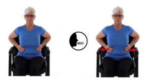 A person holding their lower ribcage and taking a deep breath.