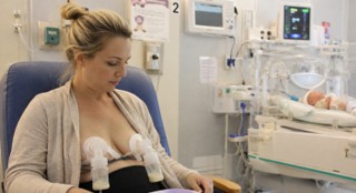 A woman expressing milk.