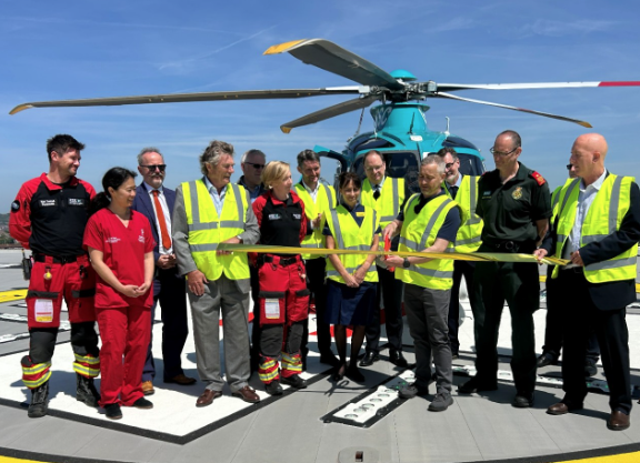 David White – the first patient to benefit from the emergency helipad on 14 March 2026 – was invited to cut the ribbon at the official opening event for the highest emergency helipad in the UK at Royal Sussex County Hospital on 22 May 20