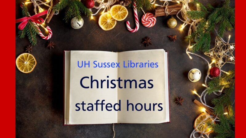 Open book with text that says UH Sussex Libraries Christmas Staffed Hours with Christmas decorations around the book