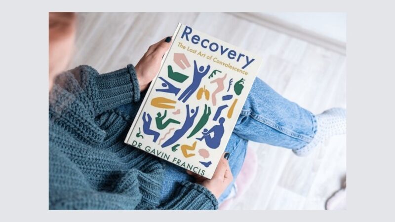 Person with a book on their lap - book of the month for January - Recovery