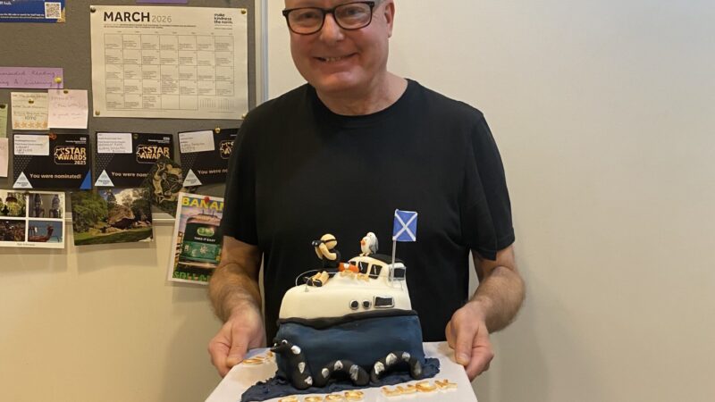 David Breeze holding his cake