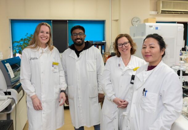clinicians wearing white lab coats