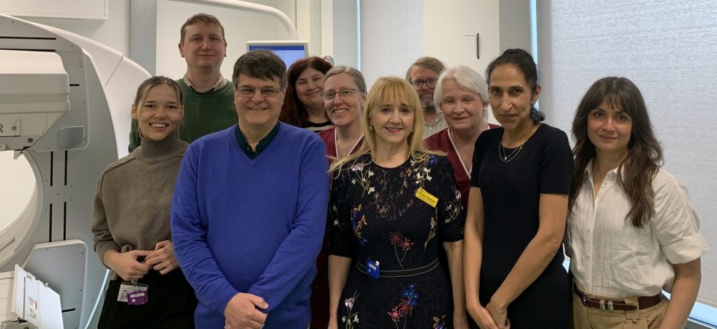 Sussex patient Darius Aibara (in blue) with clinicians administering his treatment at Royal Sussex County Hospital