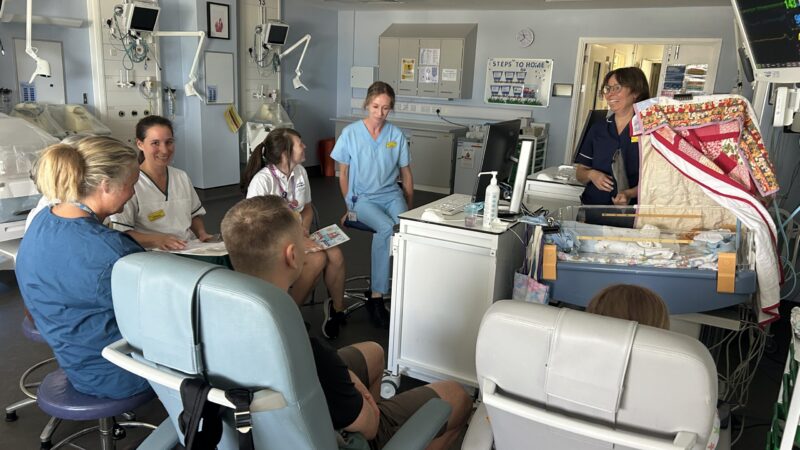 Photograph showing Family Integrated Care ward round at TMBU