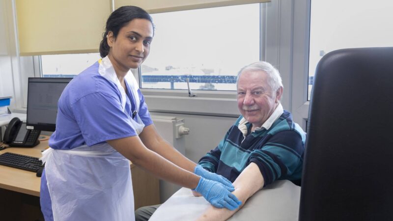 Image of a nurse with patient
